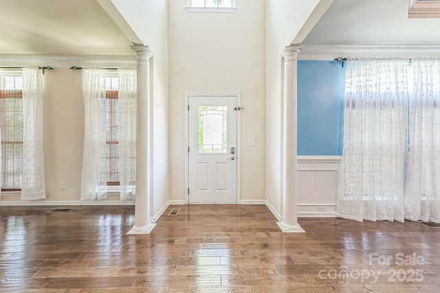 8336 Early Bird Way, Mint Hill, NC 28227 - foyer featuring ornate columns, wood finished floors, and baseboards