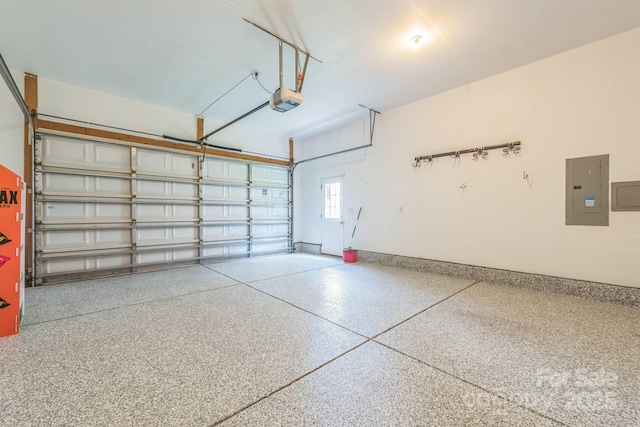 8336 Early Bird Way, Mint Hill, NC 28227 - garage featuring electric panel, baseboards, and a garage door opener