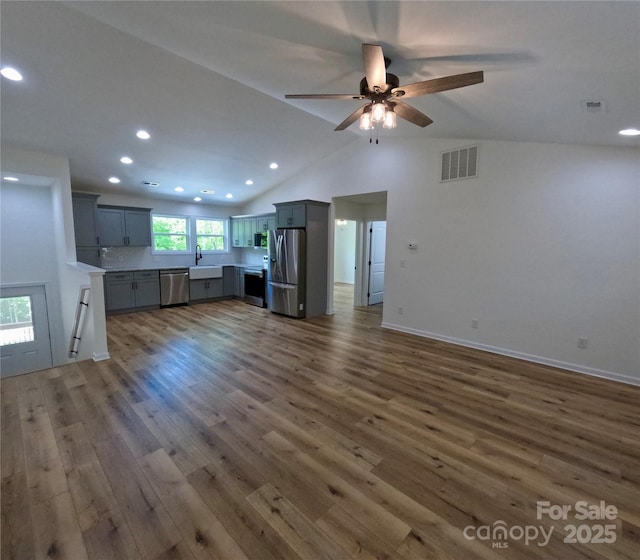 280 Haven Ridge Ln N, Marion, NC 28752 - unfurnished living room featuring wood finished floors, ceiling fan, recessed lighting, a sink, and baseboards