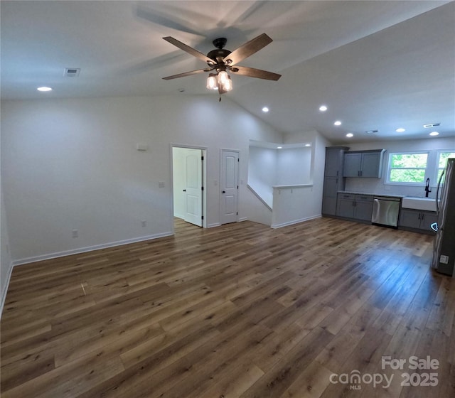 280 Haven Ridge Ln N, Marion, NC 28752 - unfurnished living room with dark wood-style flooring, a ceiling fan, recessed lighting, baseboards, and lofted ceiling