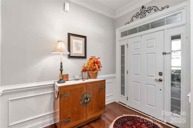 2021 Pinyon Ln, Lancaster, SC 29720 - entrance foyer featuring ornamental molding, a decorative wall, dark wood finished floors, and wainscoting