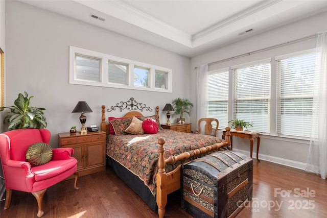 2021 Pinyon Ln, Lancaster, SC 29720 - bedroom featuring ornamental molding, wood finished floors, a raised ceiling, and baseboards