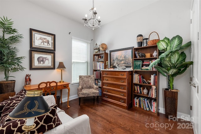 2021 Pinyon Ln, Lancaster, SC 29720 - living area featuring a chandelier, wood finished floors, and baseboards