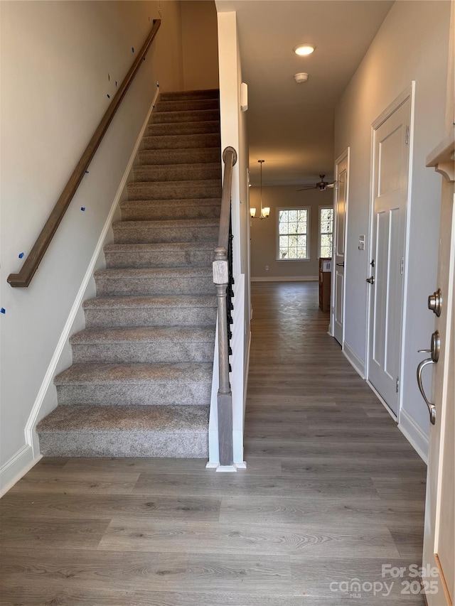 4037 Port Richmond Ave Unit 8, Gastonia, NC 28056 - stairway with wood finished floors, ceiling fan, and baseboards