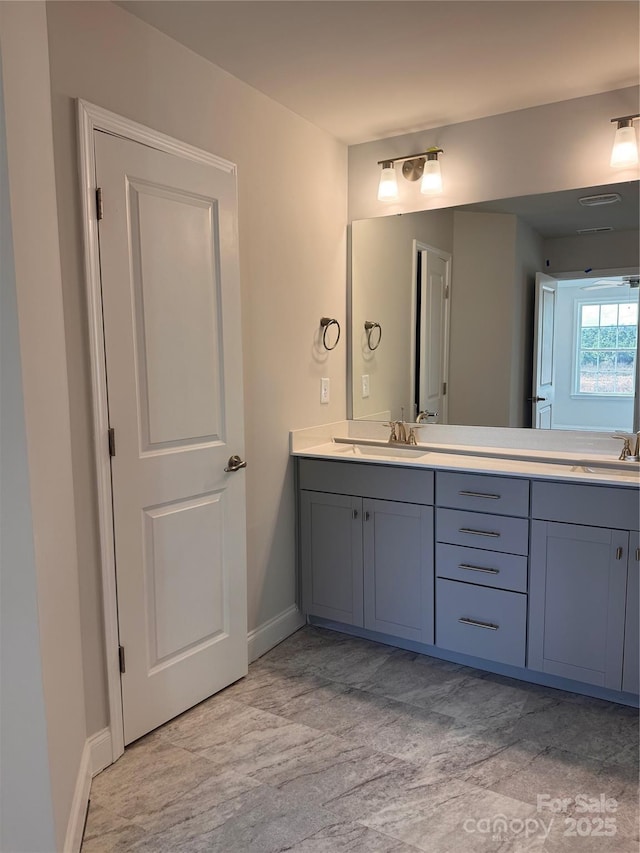 4037 Port Richmond Ave Unit 8, Gastonia, NC 28056 - bathroom with double vanity and baseboards
