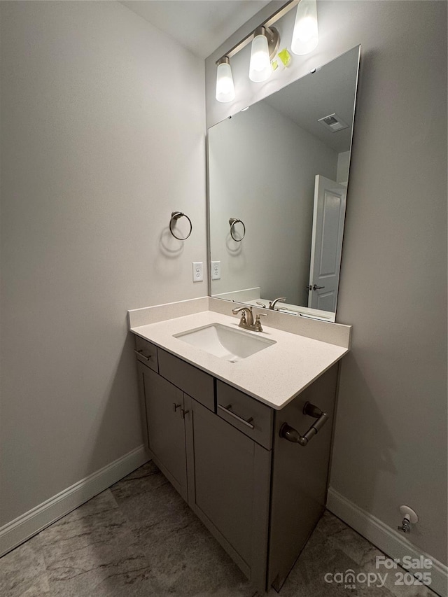 4037 Port Richmond Ave Unit 8, Gastonia, NC 28056 - bathroom with baseboards and vanity