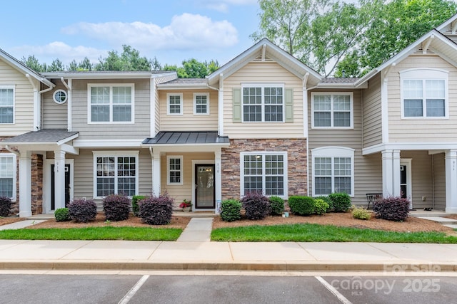 916 Coffee Tree Ln, Rock Hill, SC 29732 - view of property with uncovered parking and stone siding