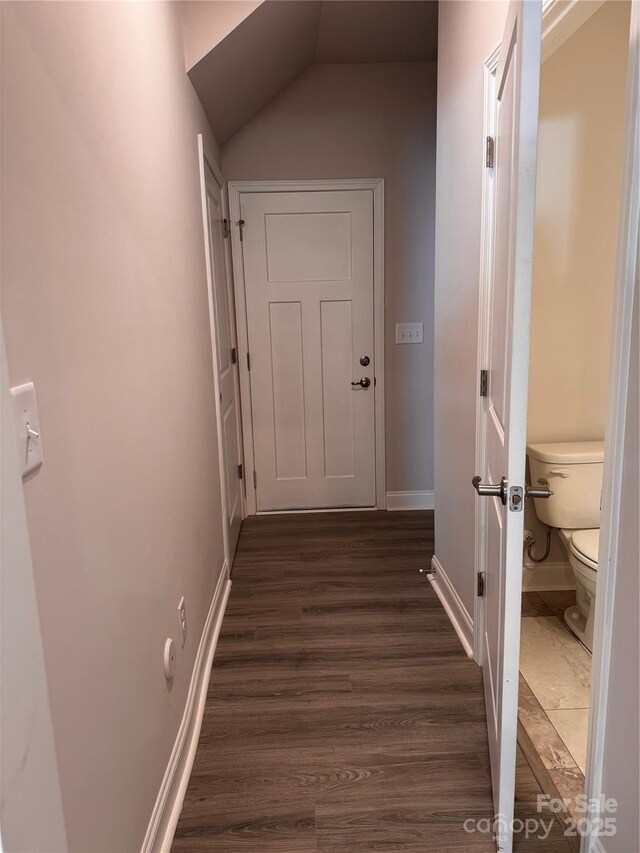 4033 Port Richmond Ave Unit 7, Gastonia, NC 28056 - corridor with dark wood-style floors, baseboards, and vaulted ceiling