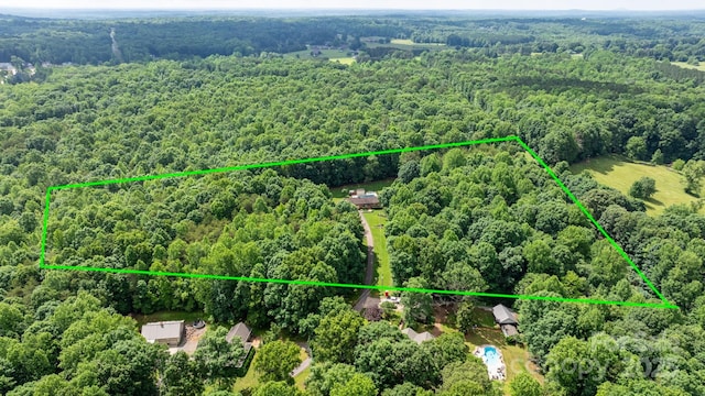 4916 Leepers Creek Rd, Maiden, NC 28650 - aerial view of property and surrounding area with a heavily wooded area and property parcel outlined