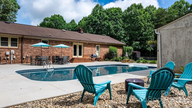 4916 Leepers Creek Rd, Maiden, NC 28650 - view of swimming pool featuring entry steps, a patio area, and area for grilling