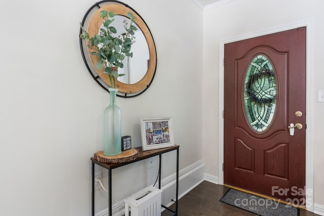 4916 Leepers Creek Rd, Maiden, NC 28650 - entrance foyer featuring baseboards, dark wood-type flooring, and crown molding