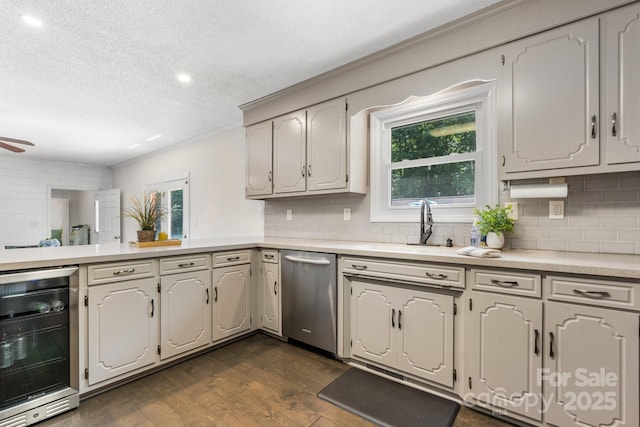 4916 Leepers Creek Rd, Maiden, NC 28650 - kitchen with stainless steel dishwasher, wine cooler, dark wood-type flooring, decorative backsplash, and a textured ceiling