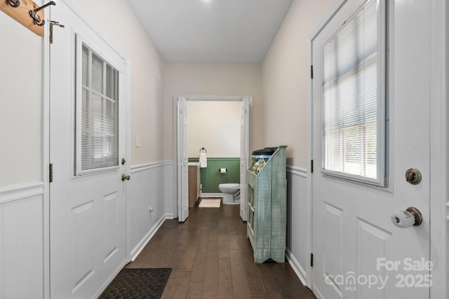 4916 Leepers Creek Rd, Maiden, NC 28650 - laundry room featuring a wainscoted wall, dark wood finished floors, and washing machine and clothes dryer