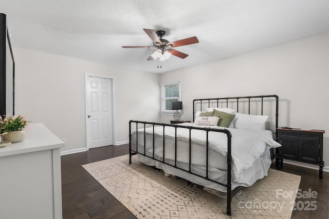 4916 Leepers Creek Rd, Maiden, NC 28650 - bedroom with dark wood-style flooring, baseboards, and ceiling fan