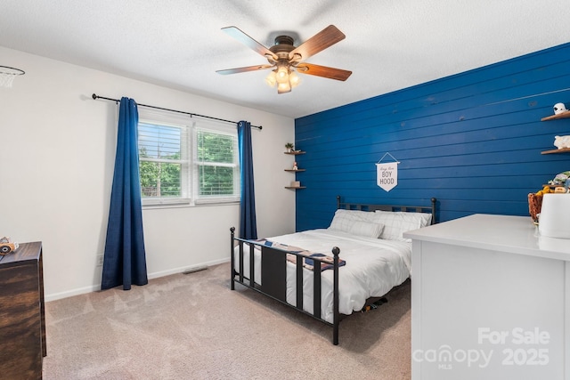 4916 Leepers Creek Rd, Maiden, NC 28650 - carpeted bedroom featuring ceiling fan, baseboards, and a textured ceiling