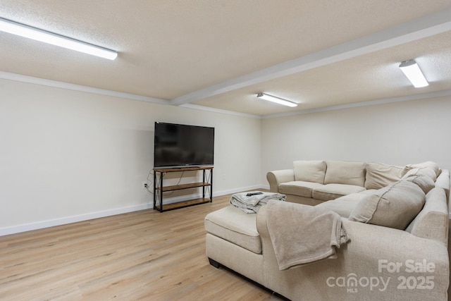4916 Leepers Creek Rd, Maiden, NC 28650 - living room featuring light wood-style flooring, beam ceiling, ornamental molding, baseboards, and a textured ceiling