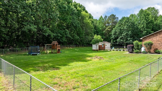 4916 Leepers Creek Rd, Maiden, NC 28650 - view of yard with a playground and a trampoline