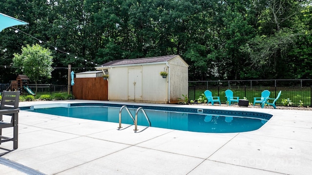4916 Leepers Creek Rd, Maiden, NC 28650 - view of swimming pool featuring a patio area and view of wooded area