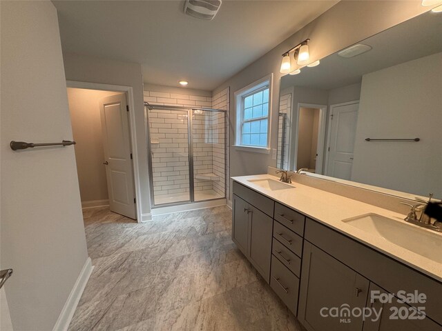 4029 Port Richmond Ave Unit 6, Gastonia, NC 28056 - full bathroom with a shower stall, baseboards, and double vanity