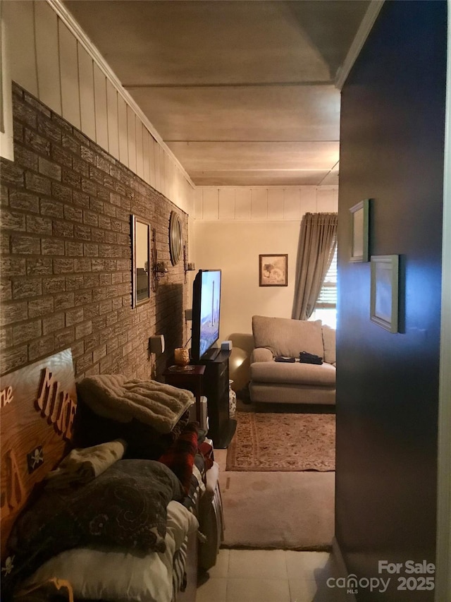 3715 Vanderburg Dr, Concord, NC 28025 - living area featuring brick wall and tile patterned floors