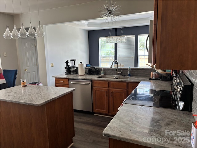 10826 Claude Freeman Dr, Charlotte, NC 28262 - kitchen with dishwasher, a sink, dark wood finished floors, brown cabinetry, and a center island