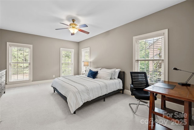 9021 Unbridle Ln, Waxhaw, NC 28173 - bedroom featuring light carpet, baseboards, a desk, and a ceiling fan