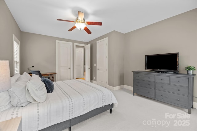 9021 Unbridle Ln, Waxhaw, NC 28173 - bedroom with light carpet, baseboards, and a ceiling fan