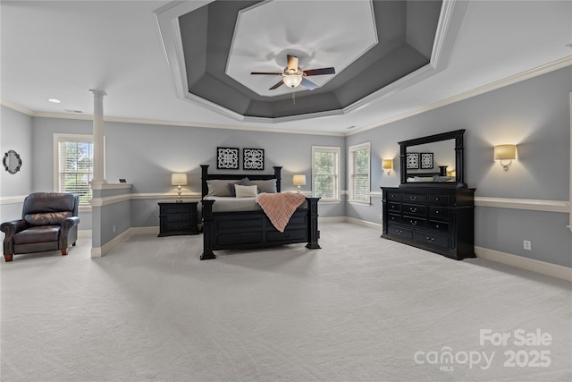 9021 Unbridle Ln, Waxhaw, NC 28173 - carpeted bedroom with ornamental molding, ornate columns, baseboards, a ceiling fan, and a tray ceiling