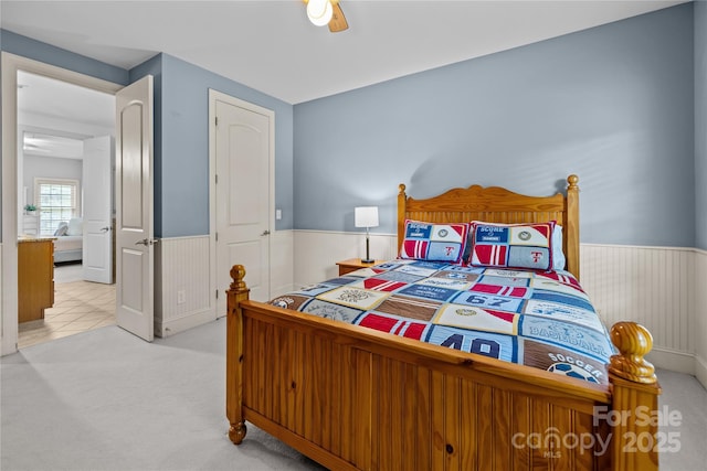 9021 Unbridle Ln, Waxhaw, NC 28173 - bedroom featuring a wainscoted wall, carpet, and ceiling fan