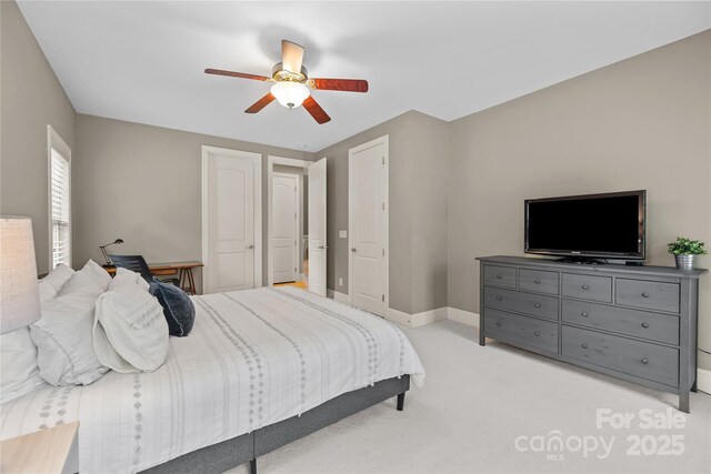 9021 Unbridle Ln, Waxhaw, NC 28173 - bedroom featuring light carpet, baseboards, and a ceiling fan