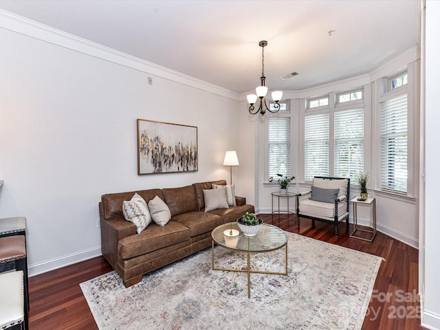 2810 Selwyn Ave Unit 104, Charlotte, NC 28209 - living area featuring a chandelier, baseboards, dark wood finished floors, and ornamental molding