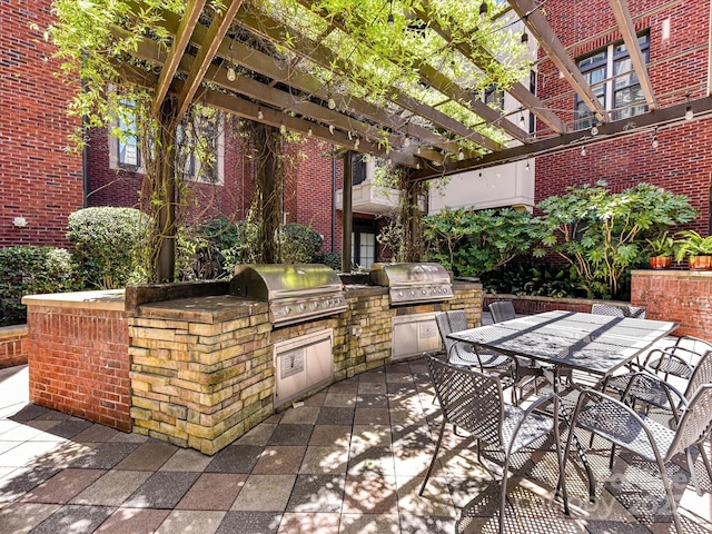 2810 Selwyn Ave Unit 104, Charlotte, NC 28209 - view of patio with a pergola and outdoor dining area