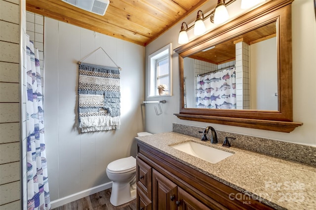 214 Sequoyah Trl, Robbinsville, NC 28771 - full bath with wood finished floors, vanity, wooden ceiling, toilet, and curtained shower