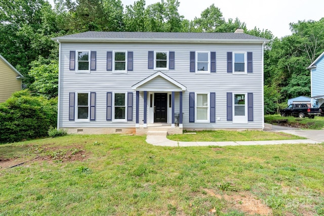 1013 Doby Springs Dr, Charlotte, NC 28262 - colonial home with a front lawn, a chimney, and crawl space