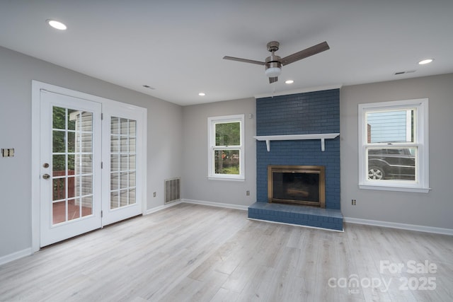 1013 Doby Springs Dr, Charlotte, NC 28262 - unfurnished living room with ceiling fan, wood finished floors, baseboards, a fireplace, and recessed lighting