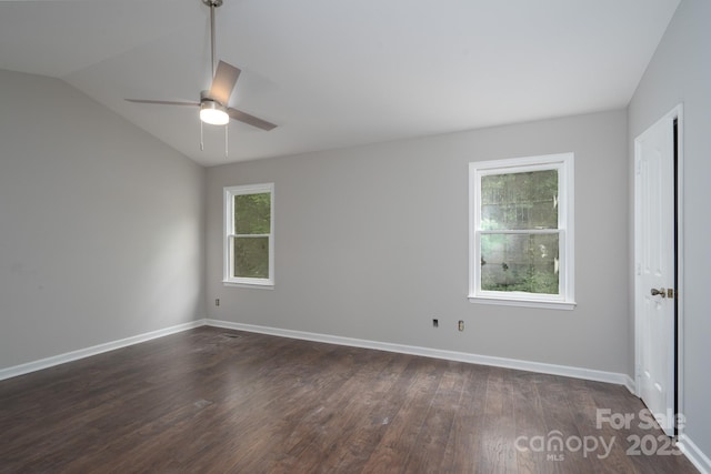 1013 Doby Springs Dr, Charlotte, NC 28262 - unfurnished room with dark wood-type flooring, a ceiling fan, baseboards, and lofted ceiling