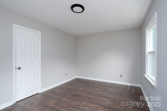 1013 Doby Springs Dr, Charlotte, NC 28262 - empty room featuring dark wood-style floors and baseboards