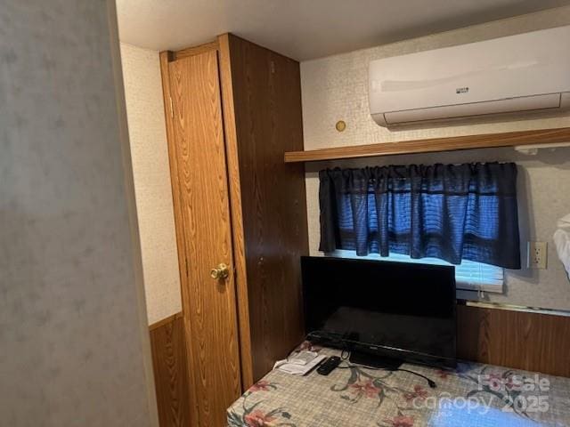 office featuring an AC wall unit