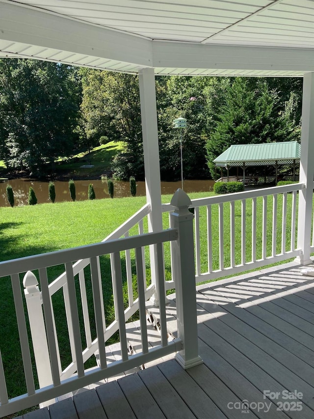 deck featuring a lawn