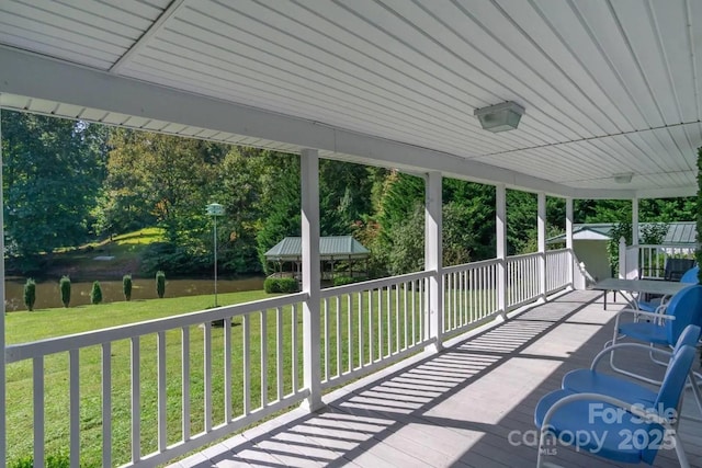 sunroom / solarium featuring plenty of natural light