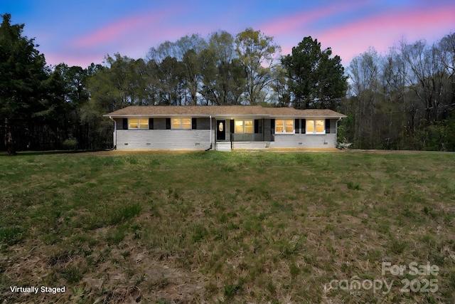 174 Maske Rd, Mount Gilead, NC 27306 - ranch-style house featuring a lawn