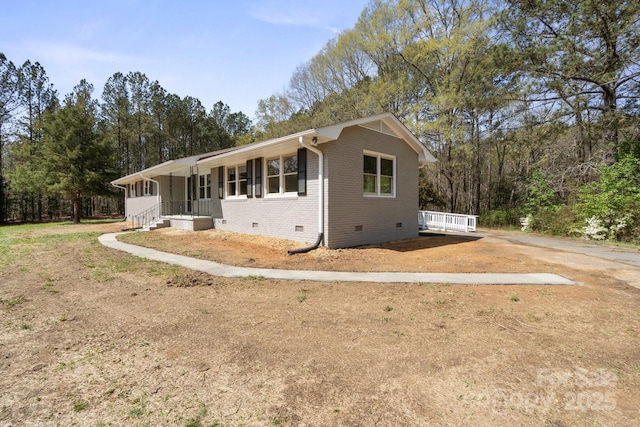 174 Maske Rd, Mount Gilead, NC 27306 - ranch-style house featuring crawl space, brick siding, and covered porch