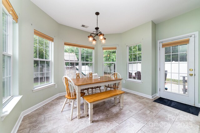 8927 Comstock Ct, Locust, NC 28097 - dining room with a chandelier and baseboards