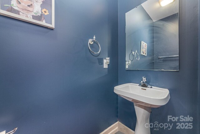8927 Comstock Ct, Locust, NC 28097 - bathroom with baseboards