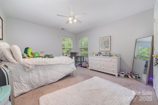 8927 Comstock Ct, Locust, NC 28097 - bedroom featuring carpet, multiple windows, and ceiling fan
