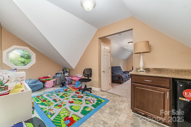 8927 Comstock Ct, Locust, NC 28097 - game room with lofted ceiling and stone finish floors