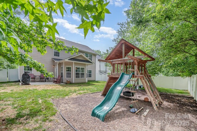 8927 Comstock Ct, Locust, NC 28097 - view of jungle gym with a patio