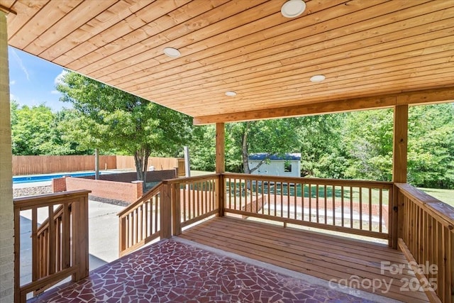 1015 4th St, Spencer, NC 28159 - wooden deck featuring a fenced backyard and a patio area