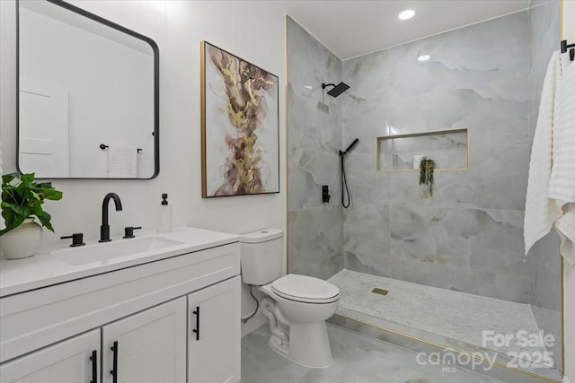 1015 4th St, Spencer, NC 28159 - full bathroom with vanity, toilet, tiled shower, marble finish flooring, and recessed lighting