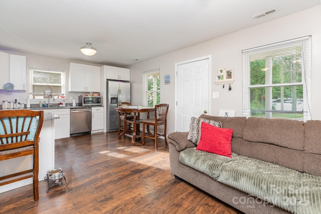 1016 W 10th Ave, Gastonia, NC 28052 - living area featuring dark wood finished floors